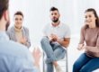 therapy group meets at opioid addiction treatment center