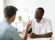 two men talking about opioid rehab center